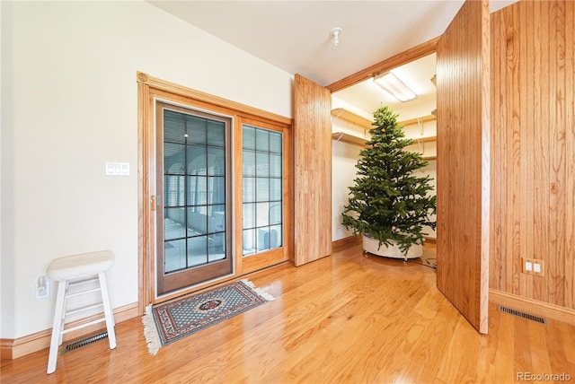 doorway to outside featuring light wood-type flooring