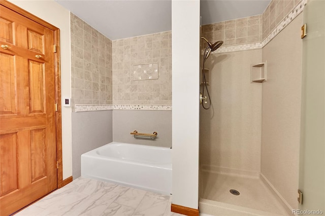 bathroom with separate shower and tub