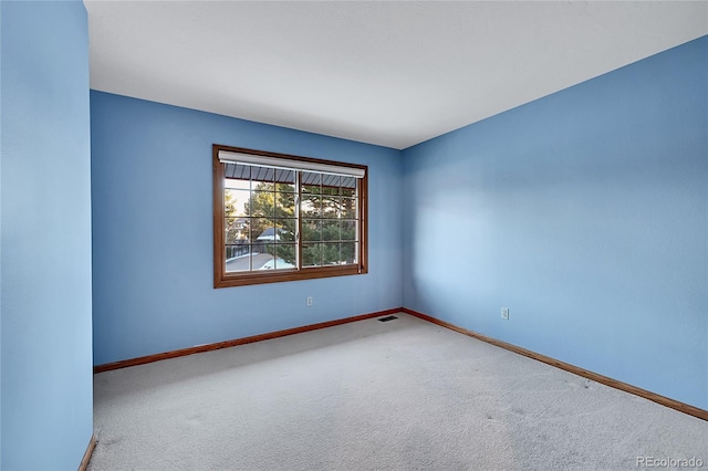 view of carpeted spare room