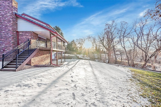 view of snowy yard