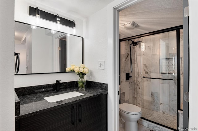2 Adams St Unit 1504, Denver, CO 80206 - full bathroom with a stall shower, vanity, and marble finish floors