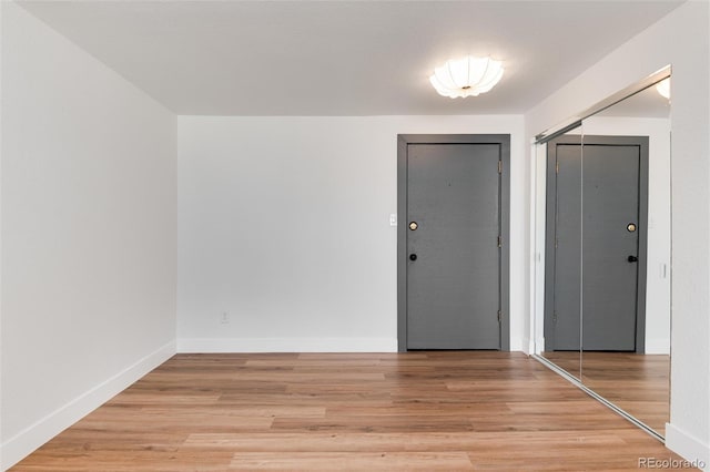 2 Adams St Unit 1504, Denver, CO 80206 - foyer entrance featuring light wood finished floors and baseboards