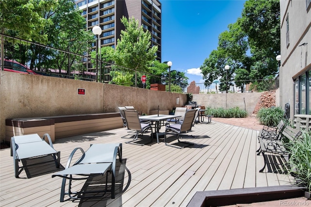 2 Adams St Unit 1504, Denver, CO 80206 - wooden deck featuring outdoor dining space