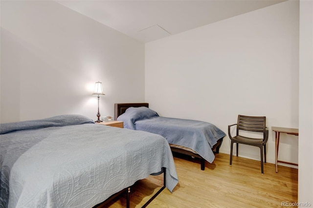 bedroom featuring light wood-type flooring