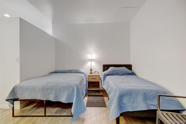 bedroom with light wood-type flooring