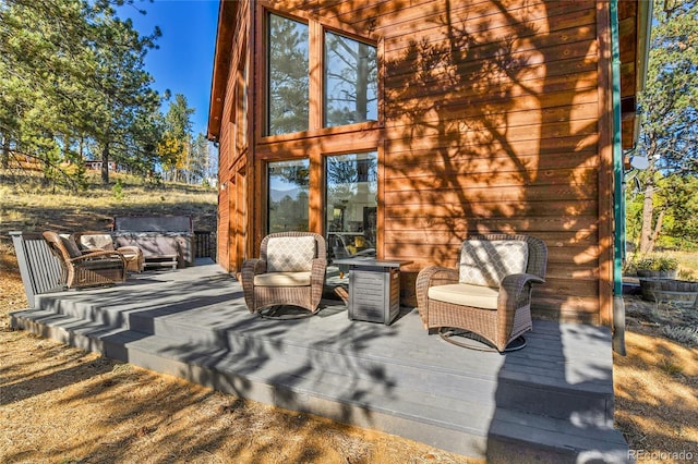 view of patio / terrace featuring a wooden deck