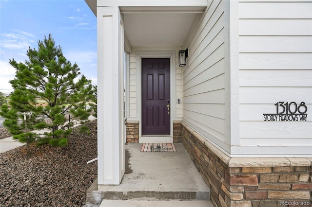 13108 Stoney Meadows Way, Peyton, CO 80831 - property entrance featuring stone siding