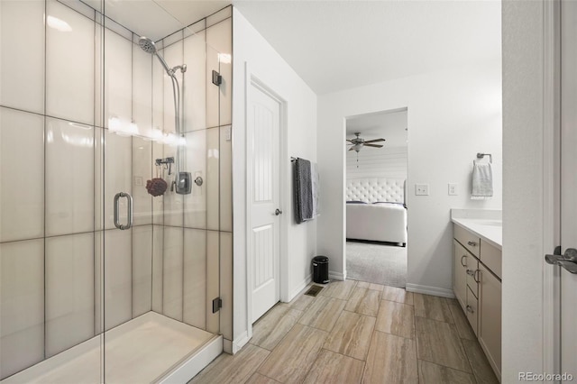 13108 Stoney Meadows Way, Peyton, CO 80831 - ensuite bathroom with a shower stall, vanity, and a ceiling fan