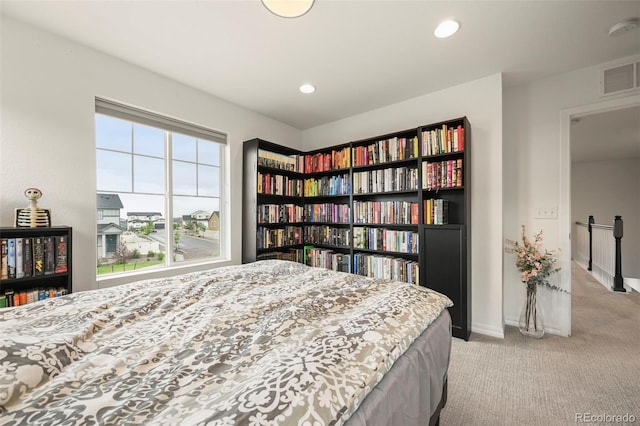 13108 Stoney Meadows Way, Peyton, CO 80831 - bedroom with light carpet and recessed lighting