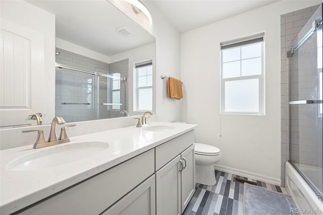 13108 Stoney Meadows Way, Peyton, CO 80831 - full bath with double vanity and shower / bath combination with glass door