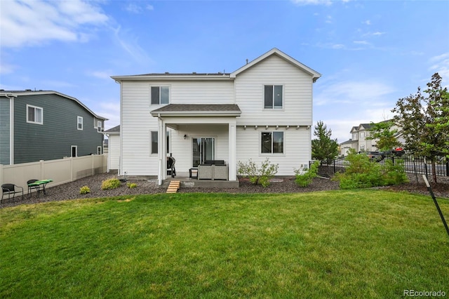 13108 Stoney Meadows Way, Peyton, CO 80831 - rear view of house with a fenced backyard and an outdoor hangout area