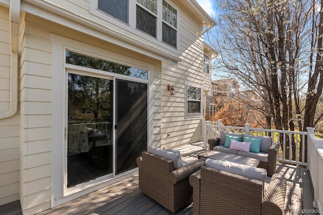 wooden deck featuring an outdoor living space