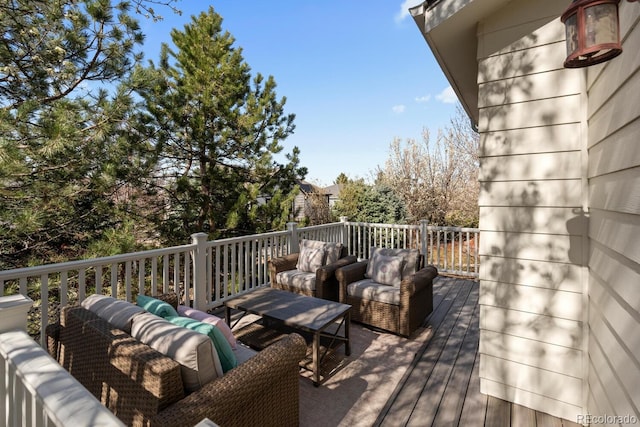 wooden deck featuring an outdoor living space