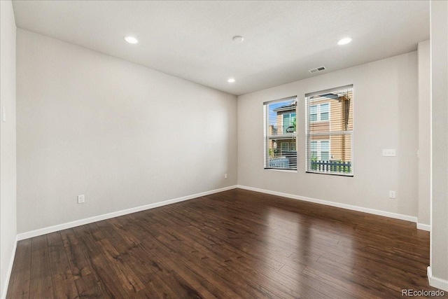 15492 W 65th Ave Unit C, Arvada, CO 80007 - spare room featuring dark wood-style floors and recessed lighting