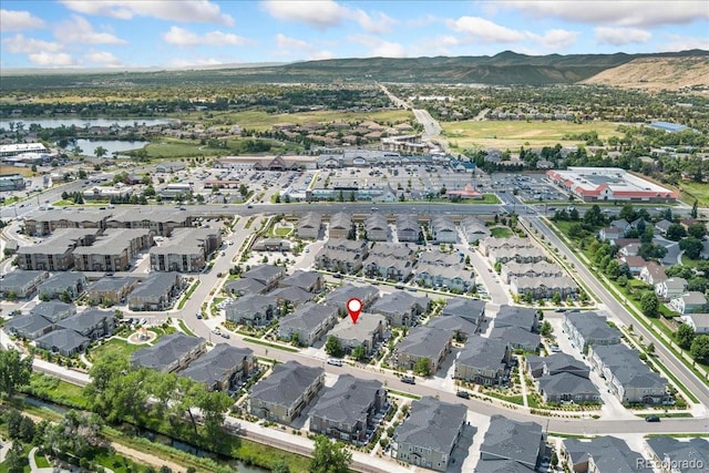 15492 W 65th Ave Unit C, Arvada, CO 80007 - aerial view of property's location with a water and mountain view and nearby suburban area