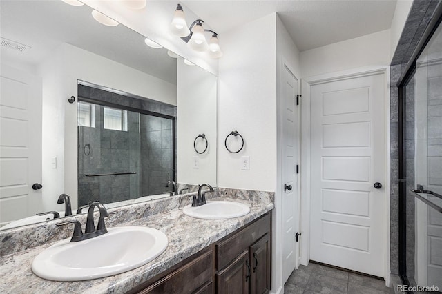 19096 E 55th Ave, Denver, CO 80249 - full bathroom with double vanity and a shower stall