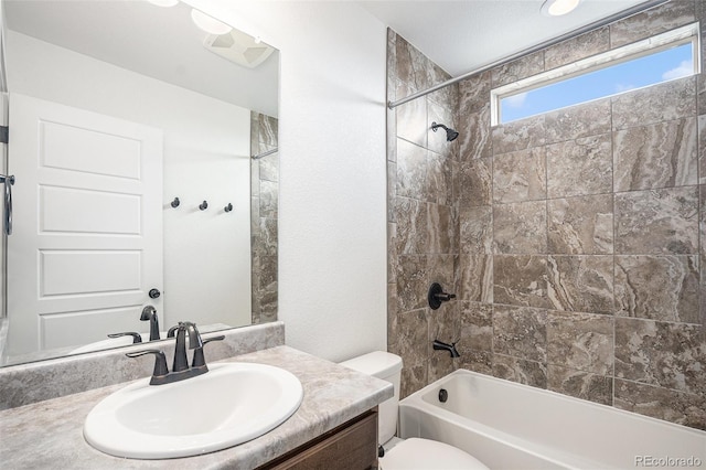 19096 E 55th Ave, Denver, CO 80249 - full bathroom featuring toilet, vanity, and shower / washtub combination