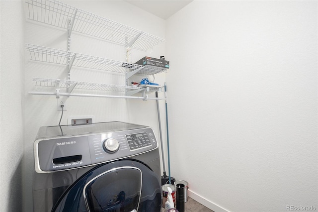 19096 E 55th Ave, Denver, CO 80249 - laundry area featuring washer / dryer and baseboards