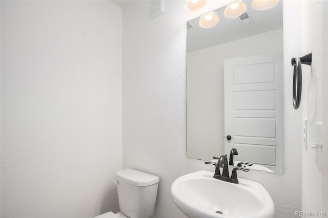 19096 E 55th Ave, Denver, CO 80249 - half bathroom with toilet and a sink