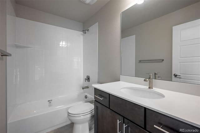 full bathroom featuring toilet, vanity, and bathtub / shower combination