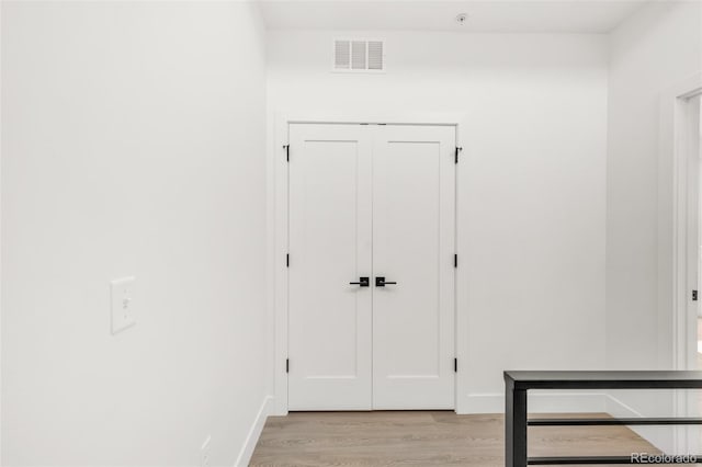 hall featuring light hardwood / wood-style flooring