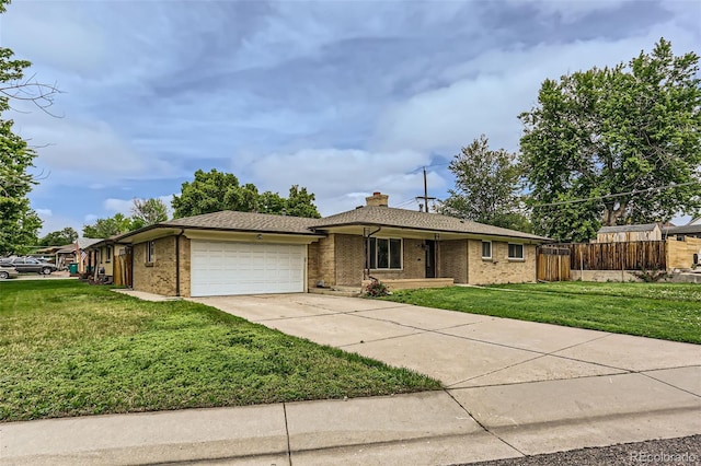 7995 Robin Ln, Denver, CO 80221 - single story home with a garage, brick siding, concrete driveway, and a chimney
