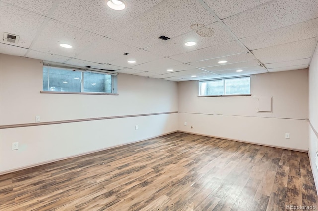7995 Robin Ln, Denver, CO 80221 - below grade area featuring wood finished floors, baseboards, and recessed lighting