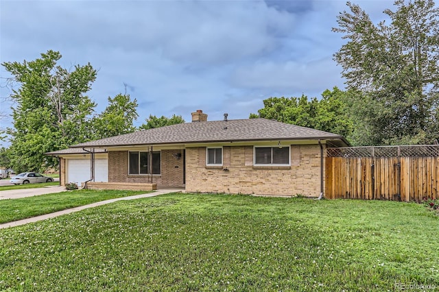 7995 Robin Ln, Denver, CO 80221 - ranch-style home featuring an attached garage, a chimney, concrete driveway, brick siding, and a shingled roof
