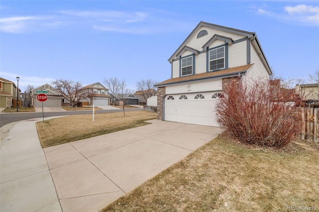 view of front of property with driveway, a garage, and brick siding