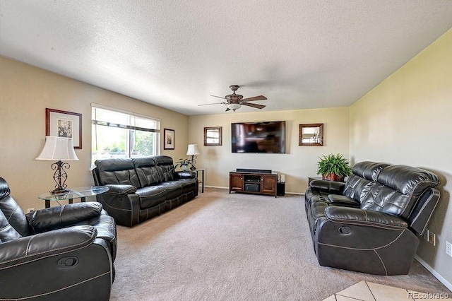 4863 Quail Ct, Frederick, CO 80504 - carpeted living area with ceiling fan, a textured ceiling, and baseboards