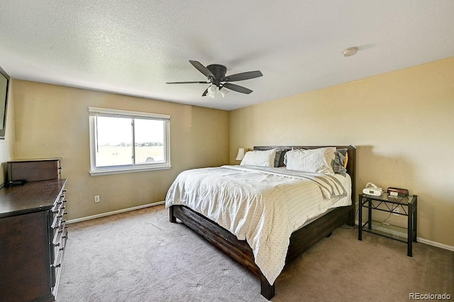 4863 Quail Ct, Frederick, CO 80504 - carpeted bedroom featuring baseboards and a ceiling fan
