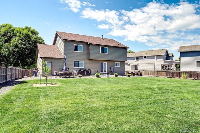 4863 Quail Ct, Frederick, CO 80504 - rear view of house with a patio