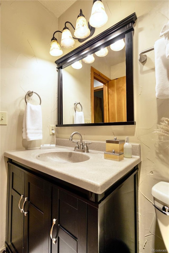 145 Arapahoe Rd Unit 102, Winter Park, CO 80482 - bathroom featuring vanity and toilet