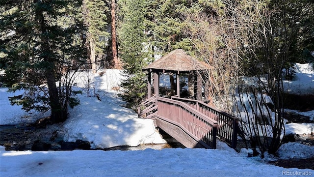 145 Arapahoe Rd Unit 102, Winter Park, CO 80482 - view of snowy exterior featuring a gazebo