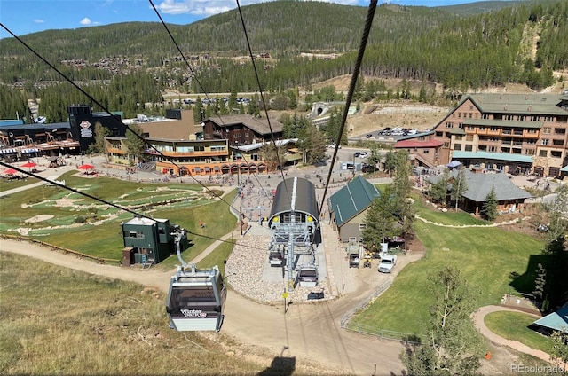 145 Arapahoe Rd Unit 102, Winter Park, CO 80482 - drone / aerial view of a mountainous background and a forest