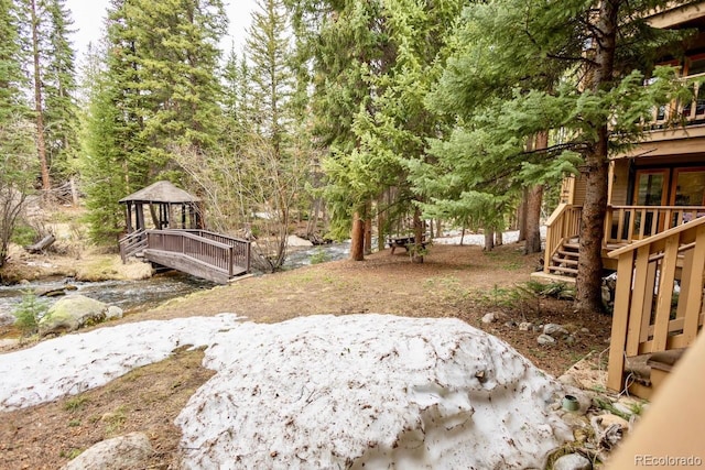 145 Arapahoe Rd Unit 102, Winter Park, CO 80482 - view of yard with a gazebo and stairs