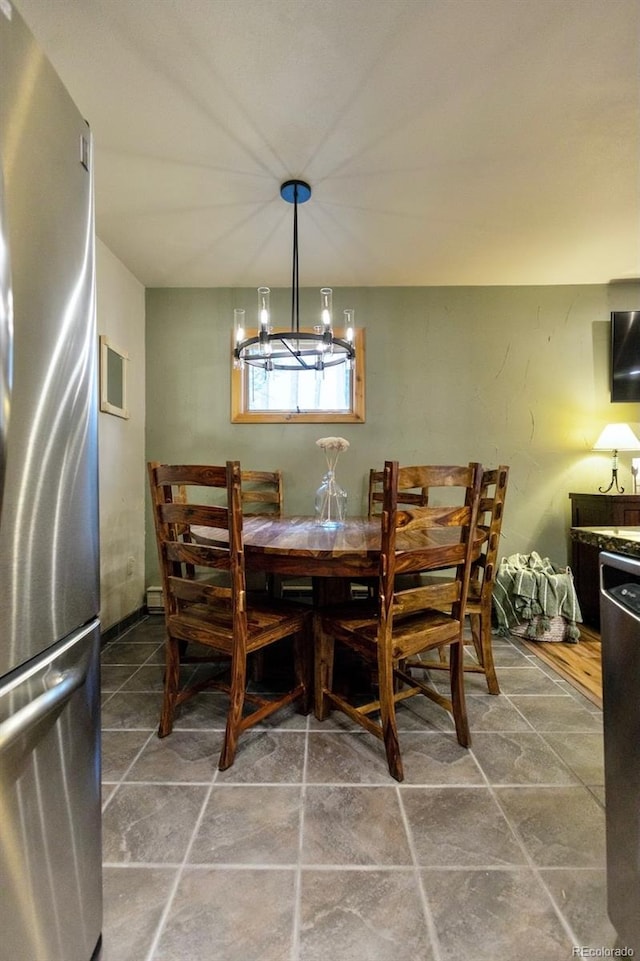 145 Arapahoe Rd Unit 102, Winter Park, CO 80482 - dining area with a chandelier