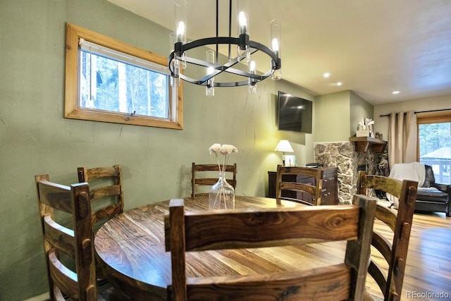 145 Arapahoe Rd Unit 102, Winter Park, CO 80482 - dining space featuring a chandelier, wood finished floors, and recessed lighting