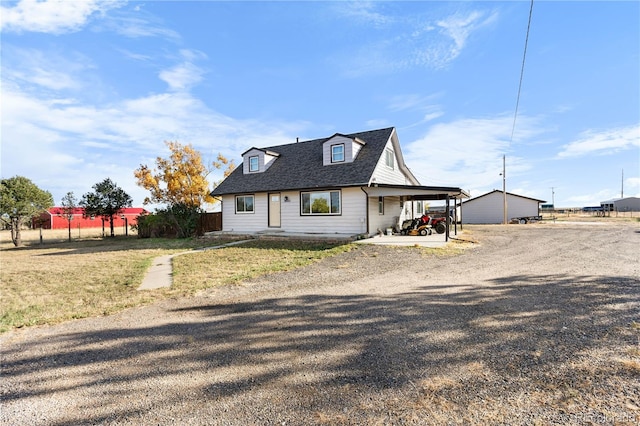 view of front facade with a carport