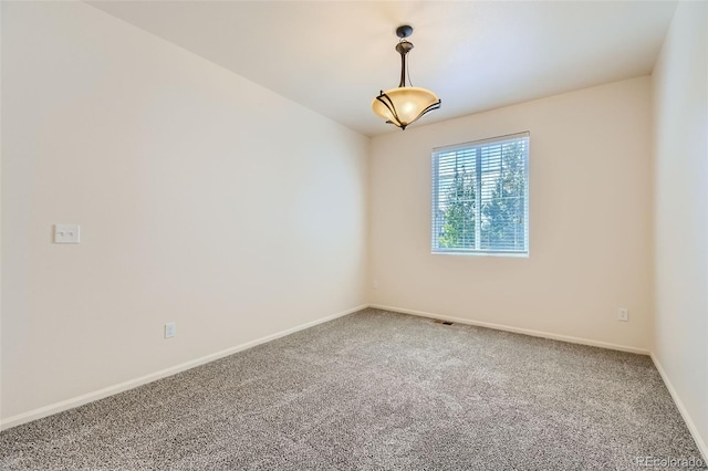 view of carpeted spare room