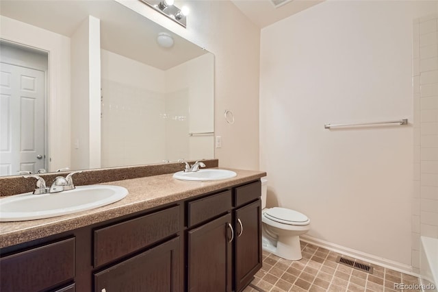 full bathroom featuring vanity, toilet, and separate shower and tub