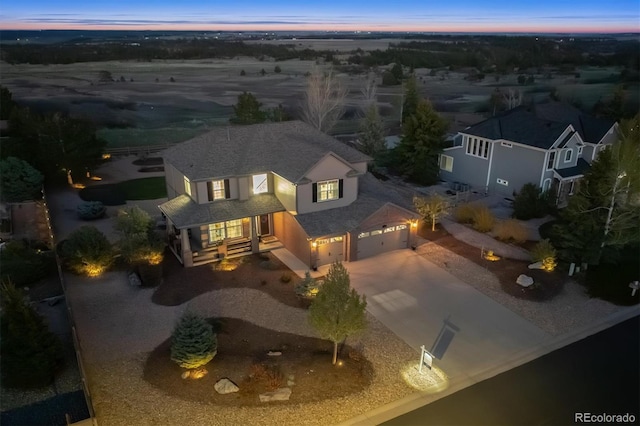 view of front facade with an attached garage and driveway