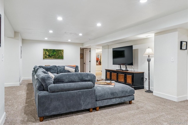 living room with baseboards, recessed lighting, and carpet