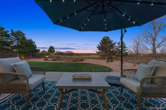 view of patio featuring a fenced backyard and outdoor lounge area