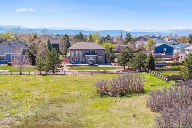 exterior space featuring a residential view and a mountain view