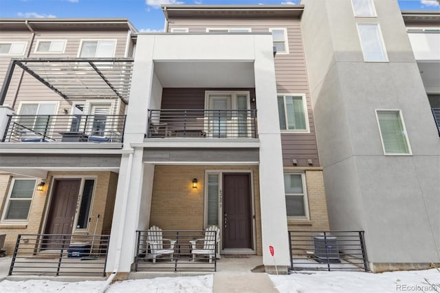 exterior space featuring a balcony and central air condition unit