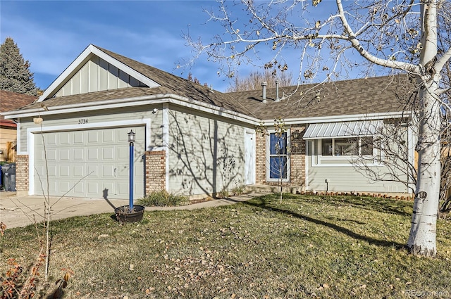 exterior space featuring a front yard and a garage