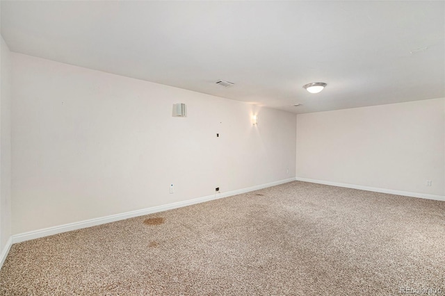 empty room with carpet flooring