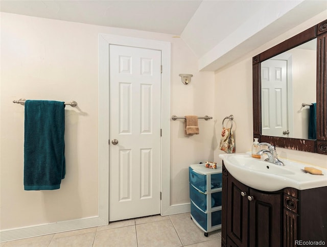 bathroom with vanity and tile patterned flooring