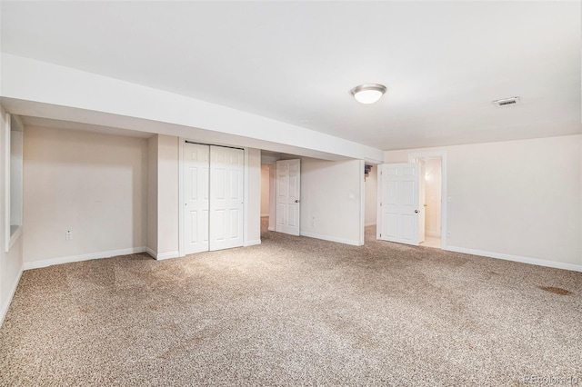 unfurnished bedroom with carpet floors and a closet